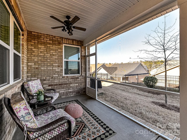 balcony with ceiling fan and a patio area