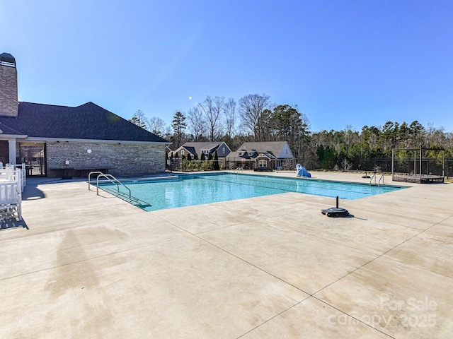 view of pool with a patio area