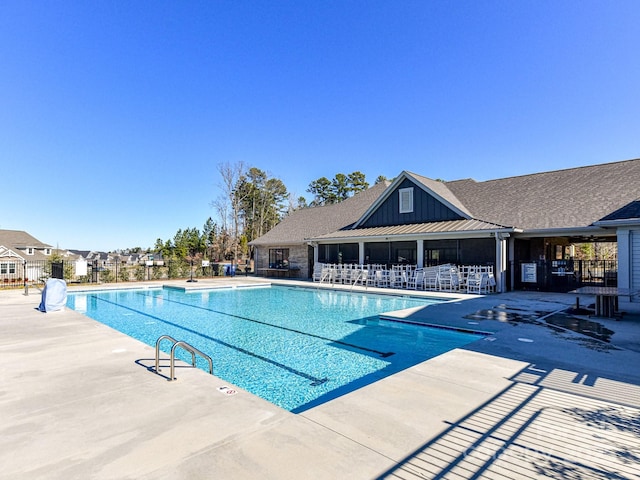 view of pool featuring a patio