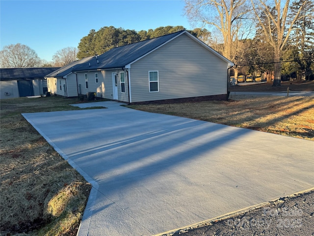 exterior space with a front lawn