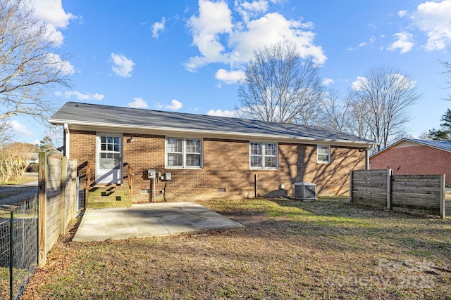 back of house featuring central AC and a patio