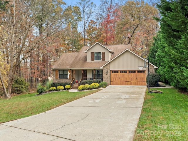 view of front of house with a porch, a garage, and a front yard