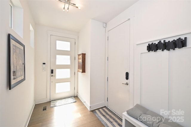 entryway with light wood-type flooring