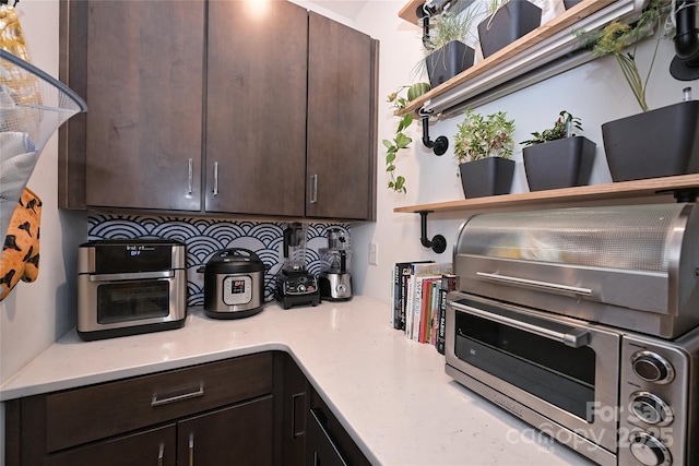 kitchen with dark brown cabinetry