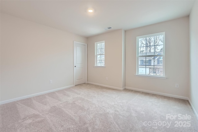 view of carpeted spare room