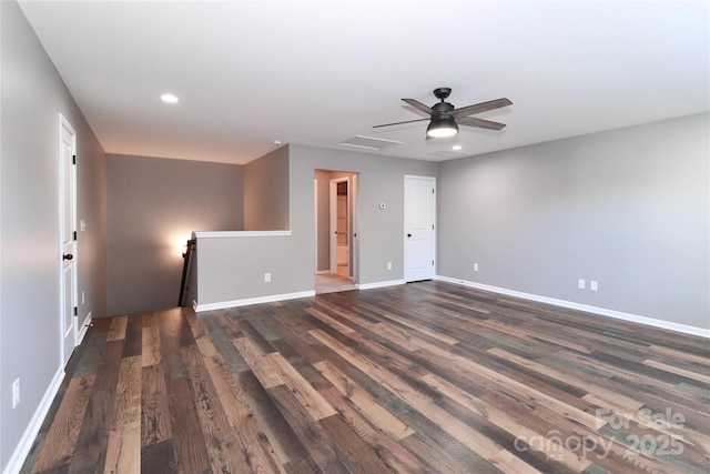 unfurnished room featuring dark wood-type flooring