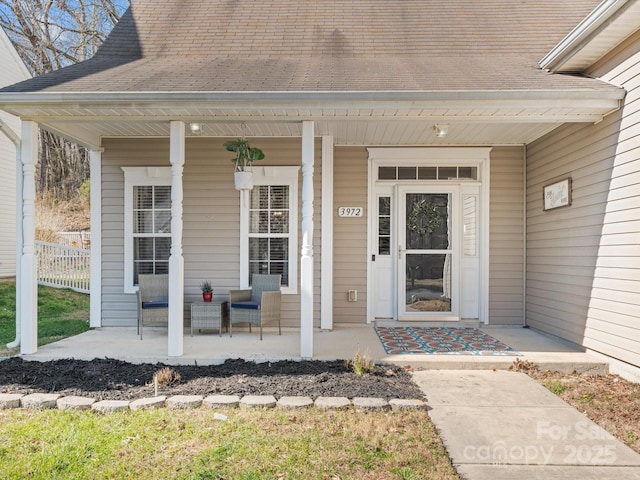 property entrance featuring a porch