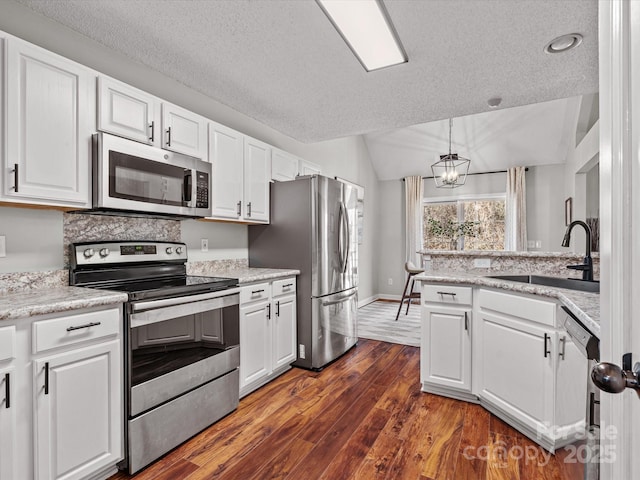 kitchen featuring white cabinets and stainless steel appliances