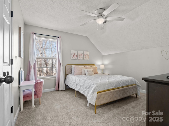 bedroom featuring lofted ceiling, a textured ceiling, ceiling fan, and light colored carpet