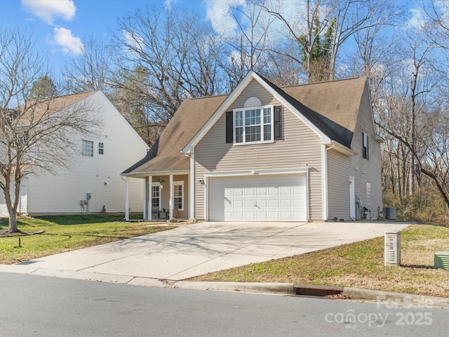 front facade with a front lawn and a garage