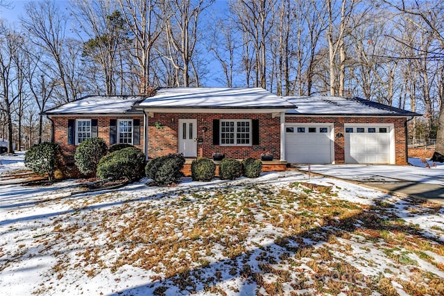 single story home with a garage