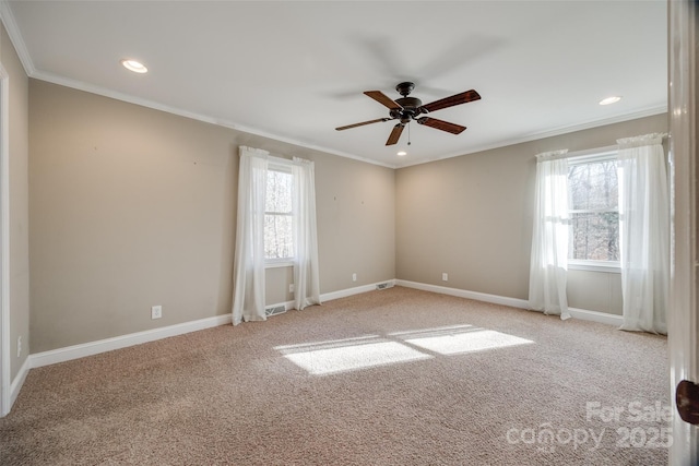 spare room with light carpet, ceiling fan, and ornamental molding