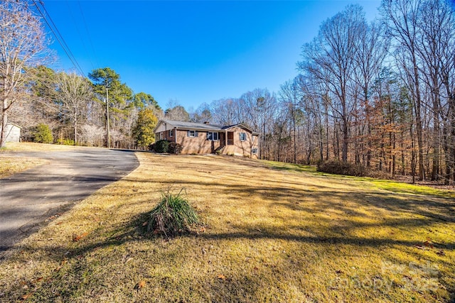 exterior space with a front lawn