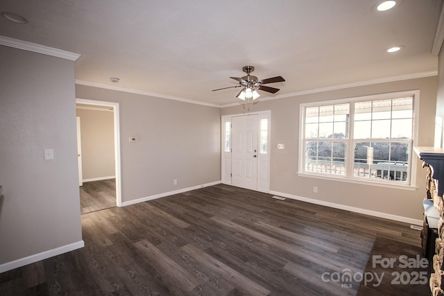 interior space featuring ceiling fan, dark wood-type flooring, and ornamental molding