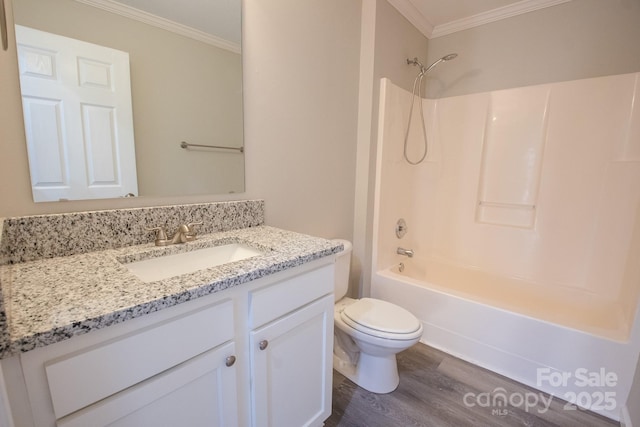 full bathroom with wood-type flooring, toilet, vanity, shower / bathtub combination, and ornamental molding