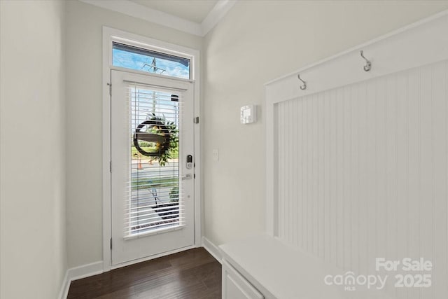 mudroom with baseboards, dark wood finished floors, and ornamental molding