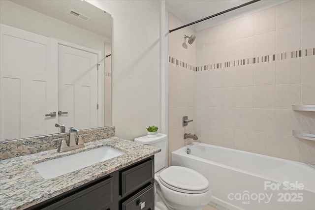 full bath featuring toilet, vanity, visible vents, and shower / bathing tub combination