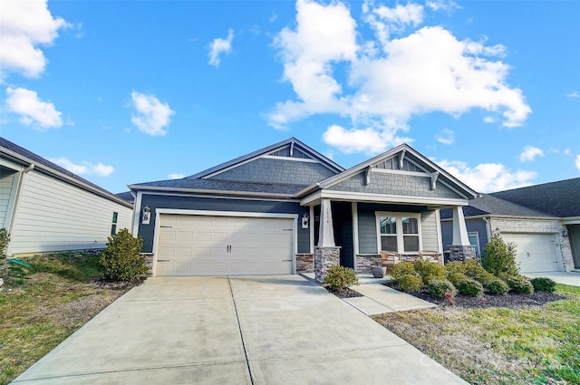 craftsman-style home with covered porch and a garage