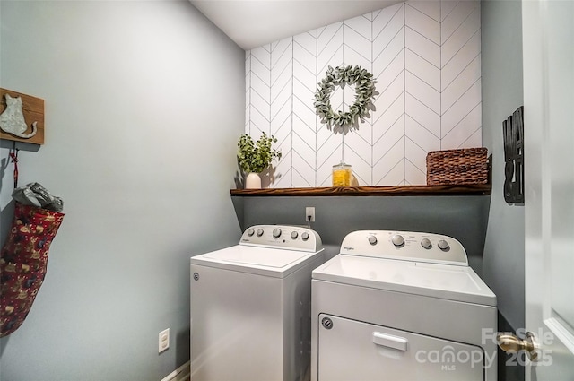 laundry room with washer and clothes dryer