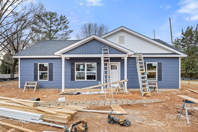 view of front of house featuring a shingled roof