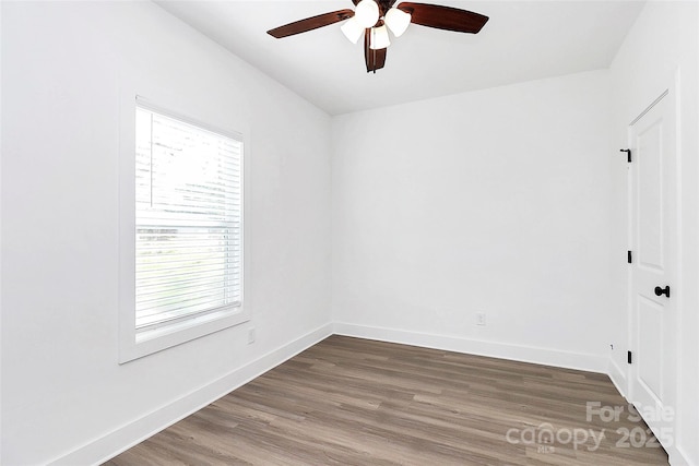 2365 28th St NE, Hickory, NC 28601 - unfurnished room with wood finished floors, baseboards, and ceiling fan