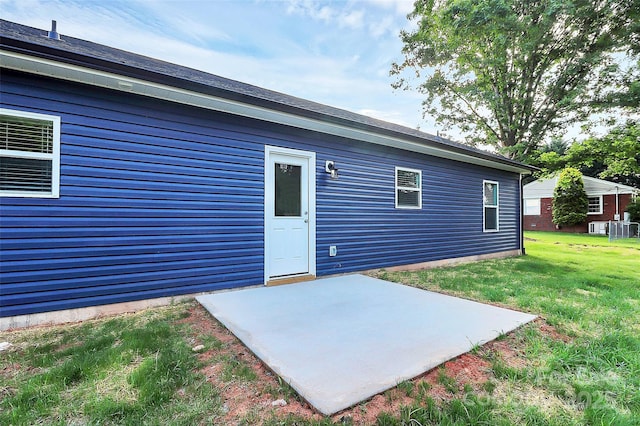 2365 28th St NE, Hickory, NC 28601 - back of house featuring a lawn, central AC unit, and a patio