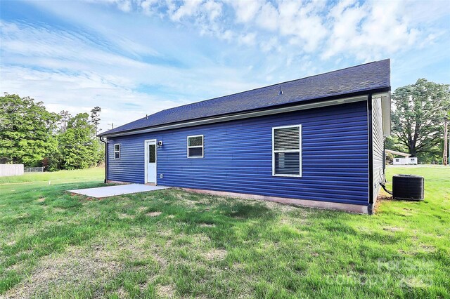 2365 28th St NE, Hickory, NC 28601 - rear view of property with central air condition unit, a yard, and a patio area