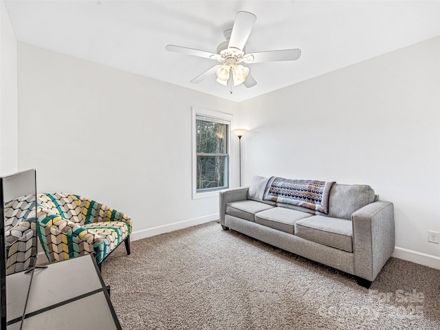 carpeted living room featuring ceiling fan