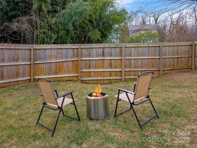 view of yard featuring a fire pit