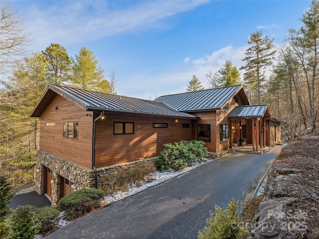 view of side of home with a garage