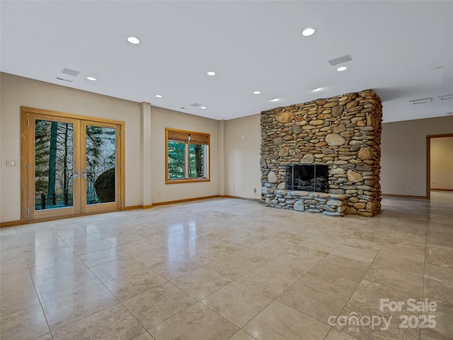 unfurnished living room featuring a fireplace