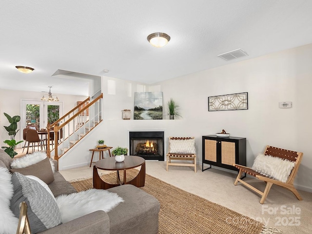 living area featuring carpet flooring