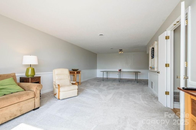 living area with carpet floors