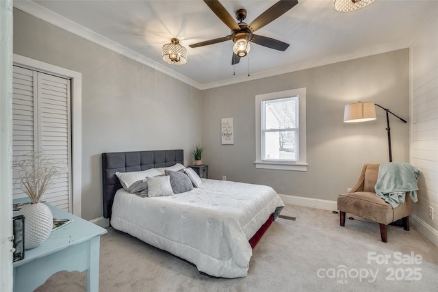 bedroom with ceiling fan, light colored carpet, and crown molding