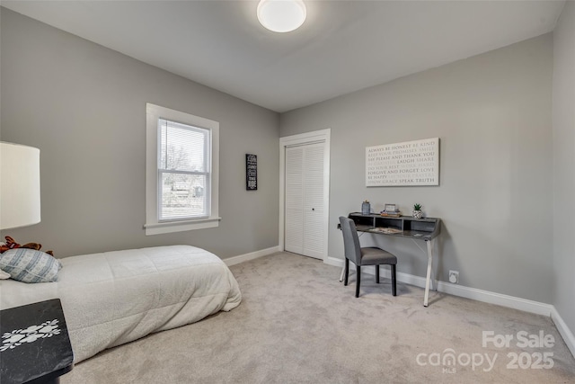 bedroom featuring light carpet