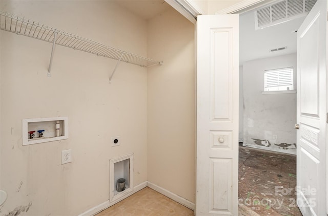 washroom featuring electric dryer hookup and washer hookup