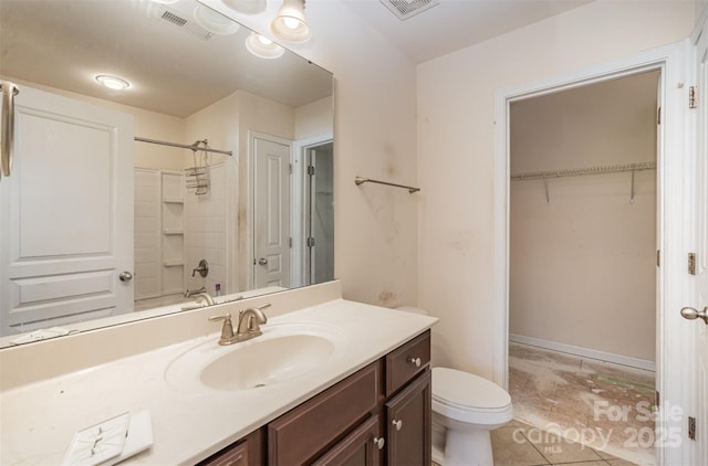 full bathroom with tile patterned floors, vanity, toilet, and shower / bath combination