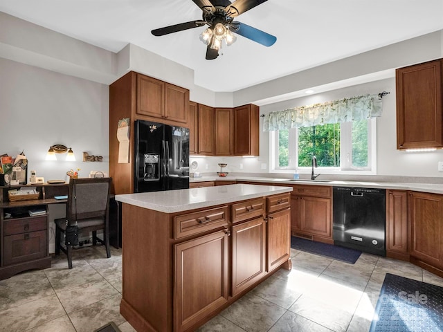 kitchen with ceiling fan, sink, black appliances, light tile patterned floors, and a center island