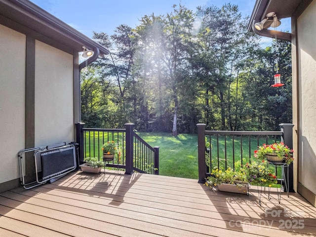 deck featuring a yard