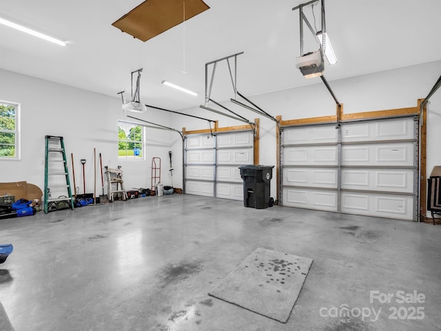 garage featuring a garage door opener