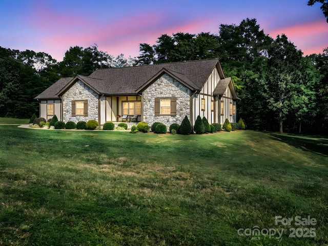 189 Jamesfield Dr, Rutherfordton, NC 28139 - tudor-style house featuring stone siding and a front lawn