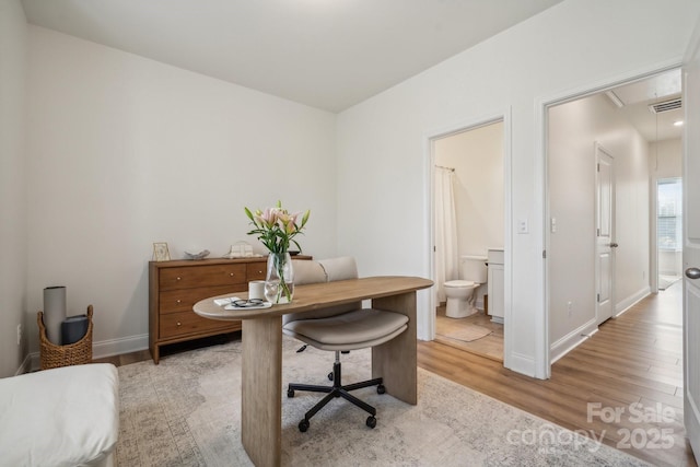 home office featuring light wood-type flooring