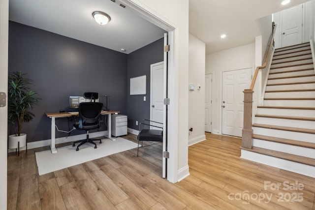 office space featuring light wood-type flooring