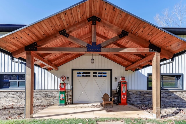 exterior space with lofted ceiling with beams