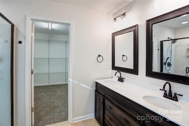 bathroom with vanity and walk in shower