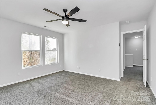 carpeted empty room with ceiling fan