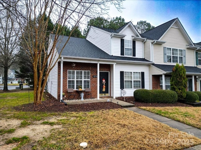 view of front property with a front lawn