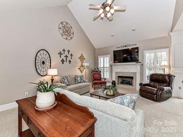 living room featuring carpet flooring, ceiling fan, and high vaulted ceiling