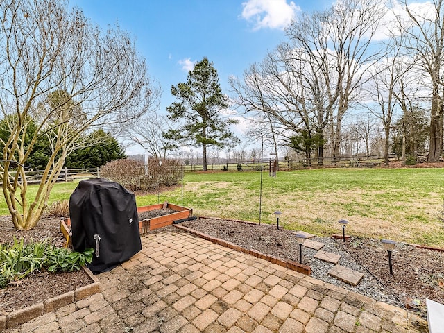 view of patio with a grill