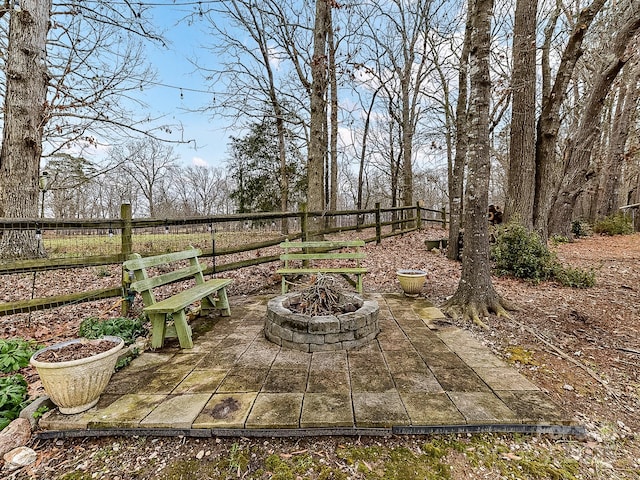 view of patio / terrace with an outdoor fire pit